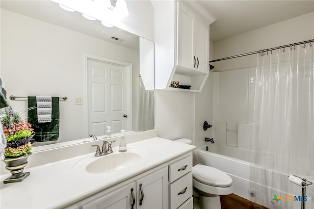 full bathroom with vanity, shower / bath combination with curtain, and toilet