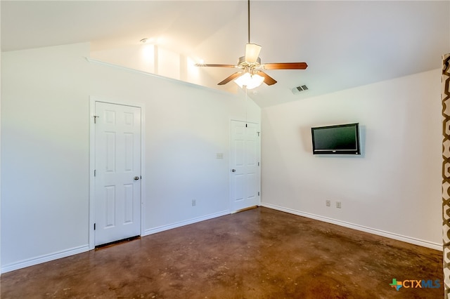 unfurnished room with ceiling fan and lofted ceiling