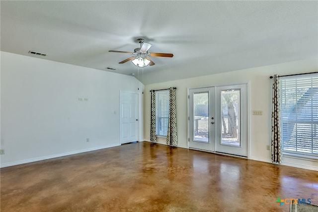 empty room featuring ceiling fan, a textured ceiling, and french doors