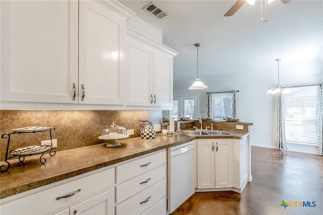 kitchen featuring white dishwasher, white cabinetry, sink, and decorative light fixtures