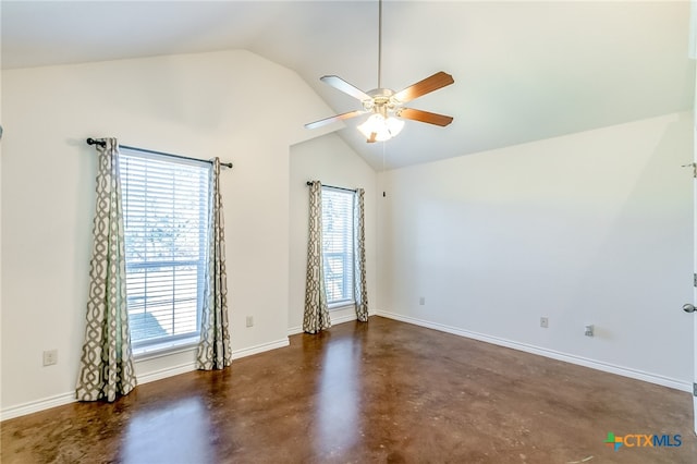 unfurnished room featuring ceiling fan and vaulted ceiling