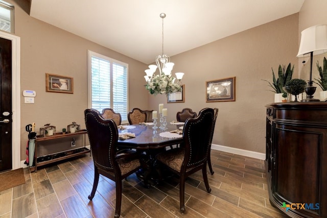 dining area featuring a chandelier