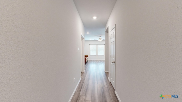1519 Merritt St, Temple, TX 76504 - hallway featuring wood finished floors, recessed lighting, and baseboards