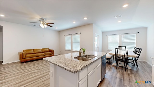 1519 Merritt St, Temple, TX 76504 - kitchen with a sink, dishwasher, light wood-style floors, an island with sink, and recessed lighting