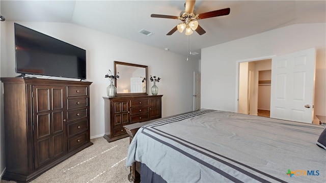 1519 Merritt St, Temple, TX 76504 - bedroom featuring lofted ceiling, light carpet, a ceiling fan, and a walk in closet