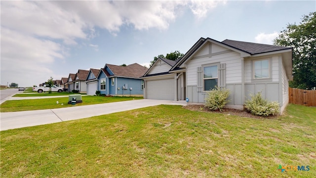 1519 Merritt St, Temple, TX 76504 - ranch-style home with concrete driveway and a garage