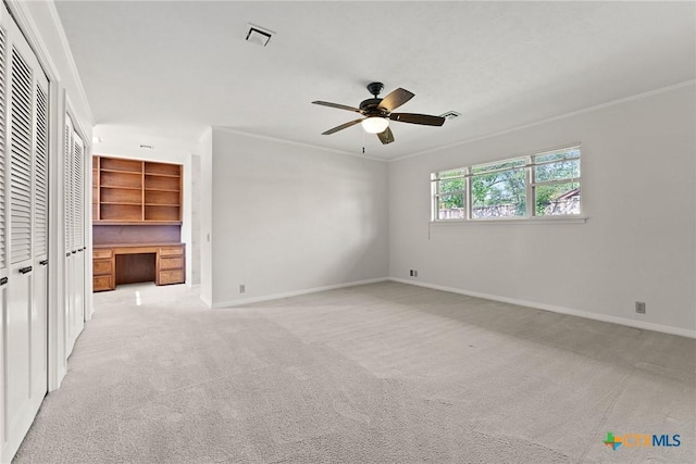 517 Cherokee Dr, Temple, TX 76504 - unfurnished bedroom featuring visible vents, crown molding, baseboards, and light carpet