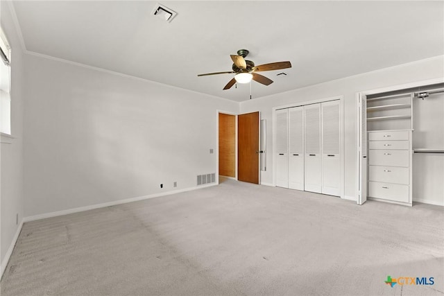 517 Cherokee Dr, Temple, TX 76504 - unfurnished bedroom with visible vents, baseboards, and multiple closets