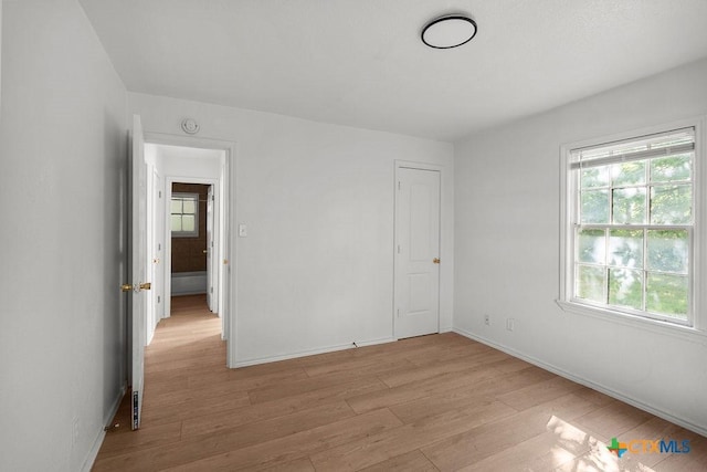 1408 Mulford St, Killeen, TX 76541 - unfurnished bedroom with light wood-type flooring and baseboards