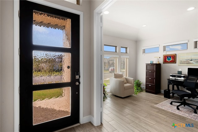 foyer with light wood-type flooring