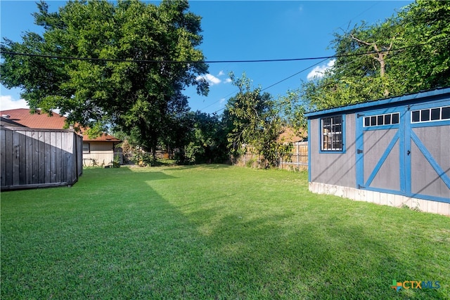 view of yard with a storage shed