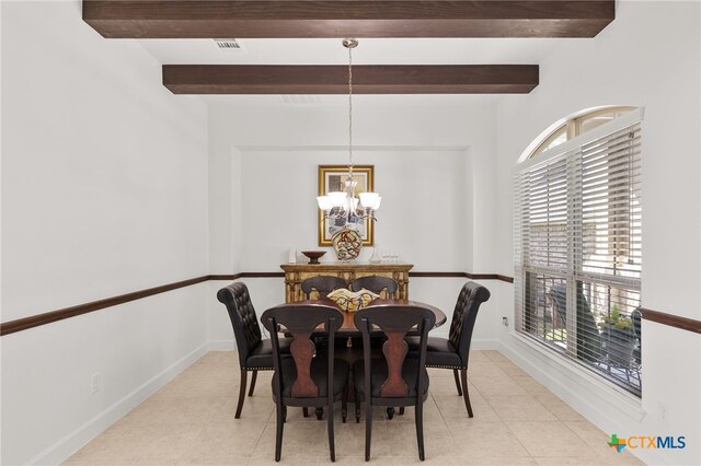 dining space with a chandelier, light tile patterned floors, beamed ceiling, baseboards, and visible vents