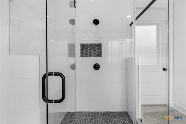 bathroom featuring a stall shower