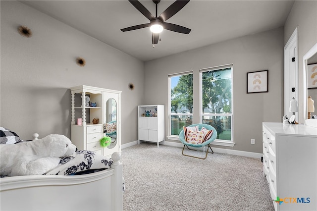 bedroom with light carpet and ceiling fan