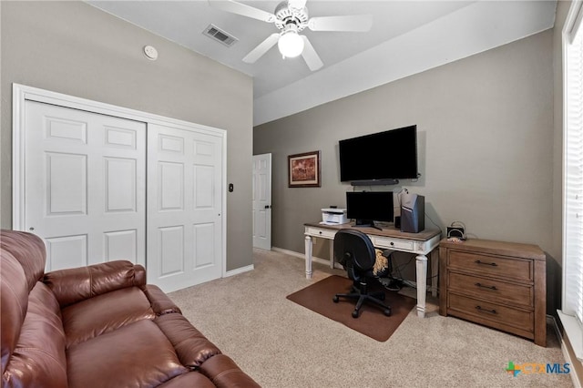 office area with a ceiling fan, carpet, visible vents, and baseboards