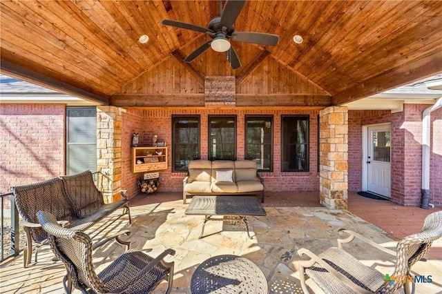 view of patio / terrace with an outdoor living space and a ceiling fan