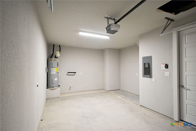 garage featuring electric panel, a garage door opener, and water heater