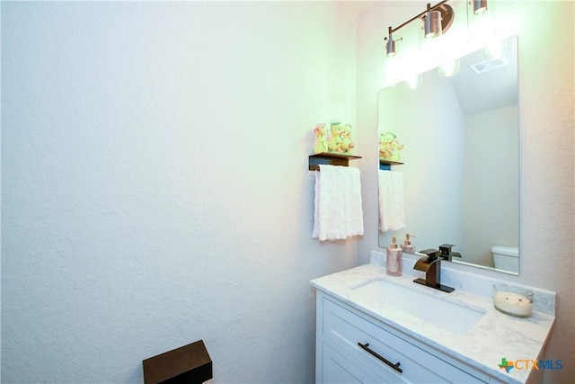 620 Saxon St, Seguin, TX 78155 - bathroom with vanity and toilet