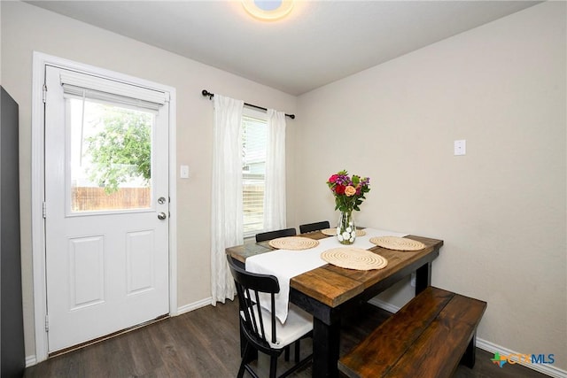 620 Saxon St, Seguin, TX 78155 - dining space featuring dark wood-style flooring and baseboards
