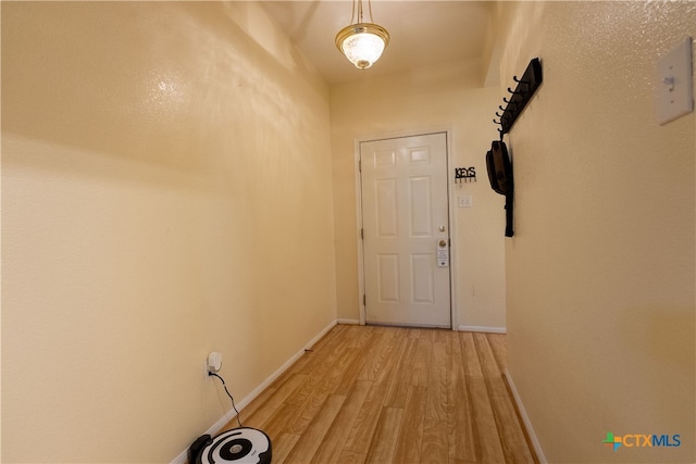 doorway to outside featuring hardwood / wood-style floors