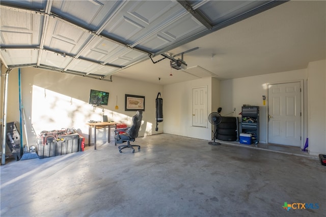 garage featuring a garage door opener