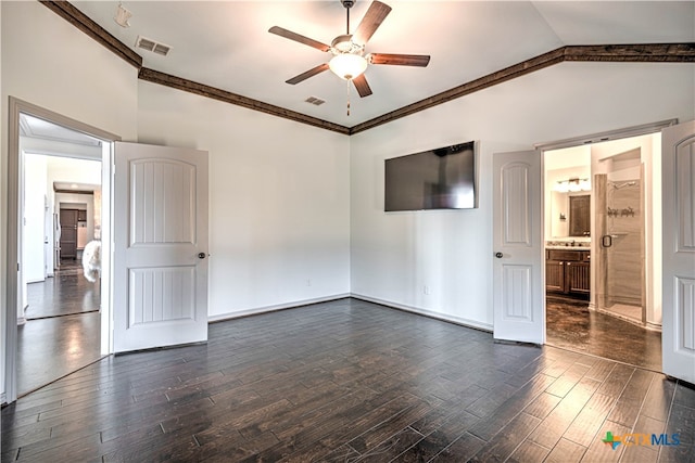 spare room featuring ornamental molding, dark hardwood / wood-style floors, ceiling fan, and vaulted ceiling