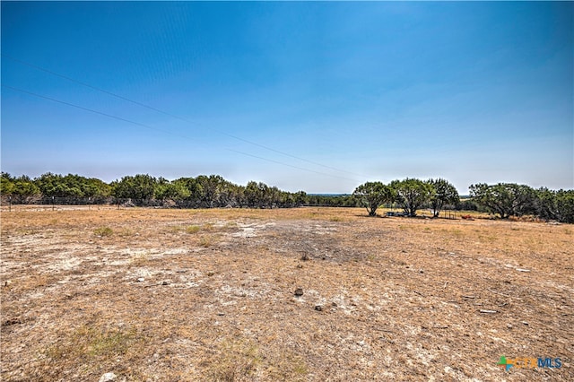 view of landscape with a rural view