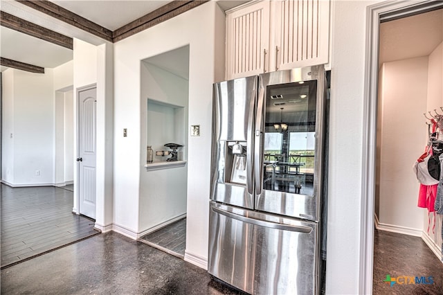 kitchen with stainless steel refrigerator with ice dispenser, beamed ceiling, and dark hardwood / wood-style flooring