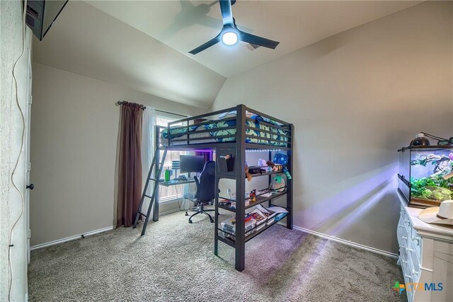 bedroom featuring carpet floors, baseboards, ceiling fan, and lofted ceiling
