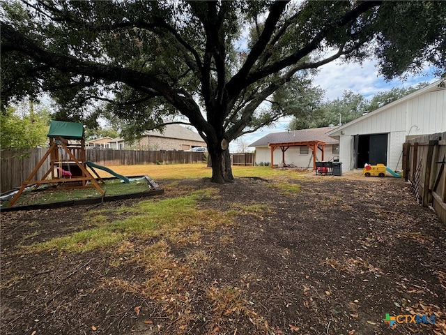 view of yard featuring a playground