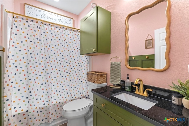 312 Holly Ave, Luling, TX 78648 - bathroom with vanity and a textured wall