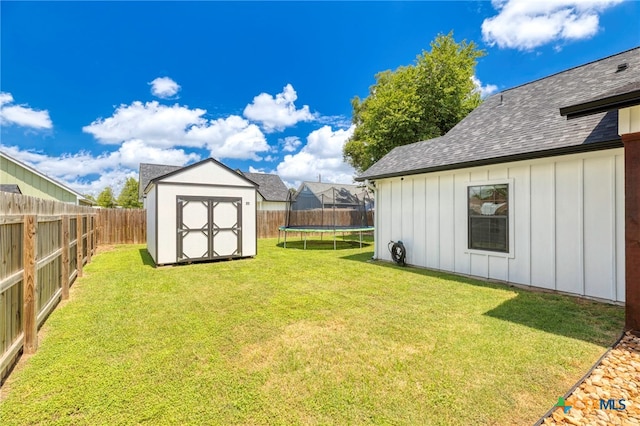 312 Holly Ave, Luling, TX 78648 - fenced backyard featuring a trampoline and a shed