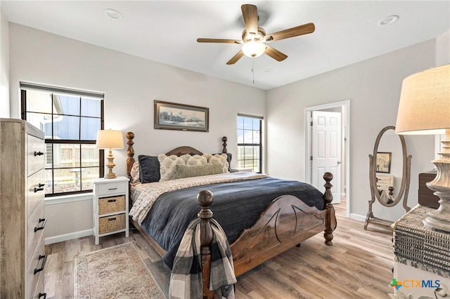 312 Holly Ave, Luling, TX 78648 - bedroom featuring light wood-style flooring and ceiling fan