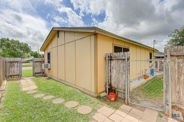 2812 Curlew St, Victoria, TX 77901 - view of property exterior featuring a gate and cooling unit