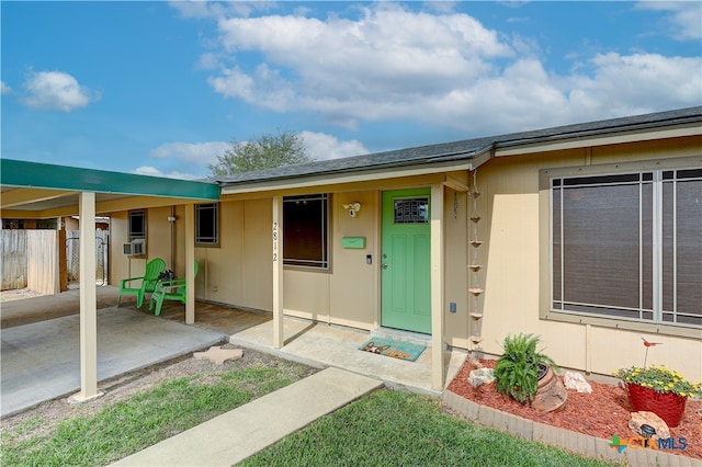 2812 Curlew St, Victoria, TX 77901 - view of exterior entry featuring a patio and cooling unit