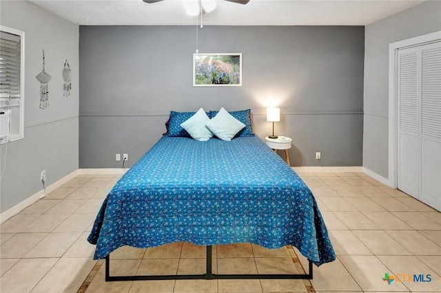 2812 Curlew St, Victoria, TX 77901 - bedroom with tile patterned floors and a ceiling fan