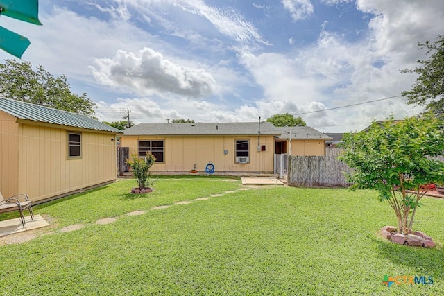 2812 Curlew St, Victoria, TX 77901 - rear view of property with an outbuilding