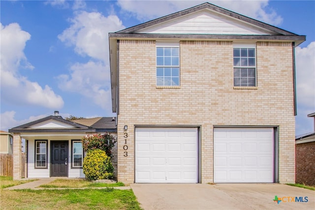 front of property with a garage