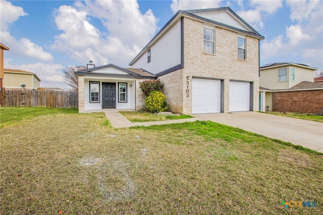 front facade featuring a garage and a front yard