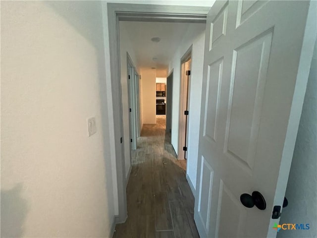 2408 Duntov Dr, Temple, TX 76504 - hall with dark wood-style floors and baseboards
