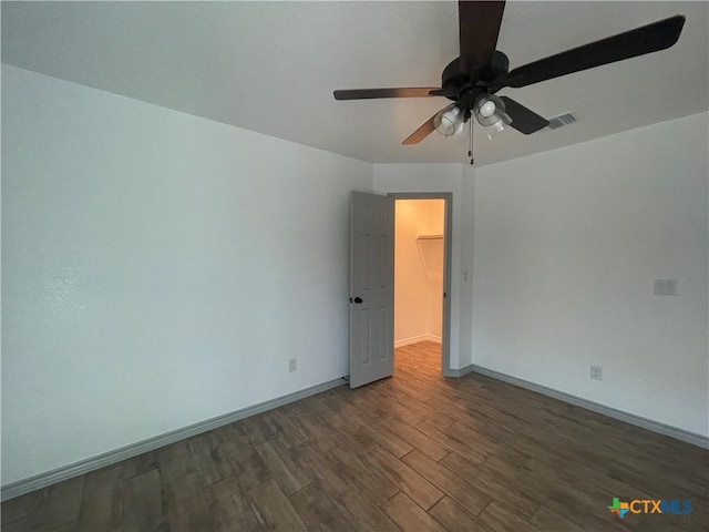 2408 Duntov Dr, Temple, TX 76504 - empty room featuring wood finished floors, a ceiling fan, and baseboards