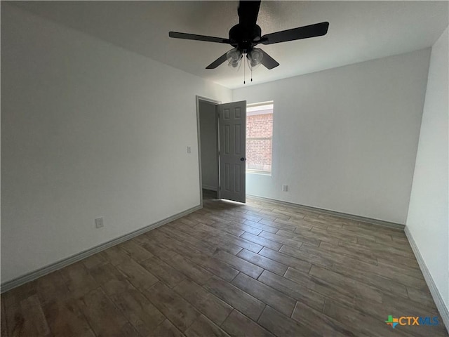 2408 Duntov Dr, Temple, TX 76504 - empty room featuring wood finished floors, a ceiling fan, and baseboards