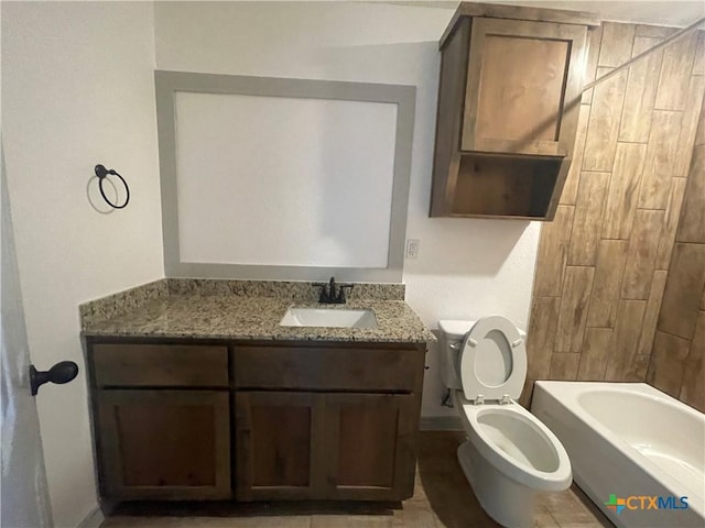 2408 Duntov Dr, Temple, TX 76504 - bathroom featuring toilet, vanity, and washtub / shower combination
