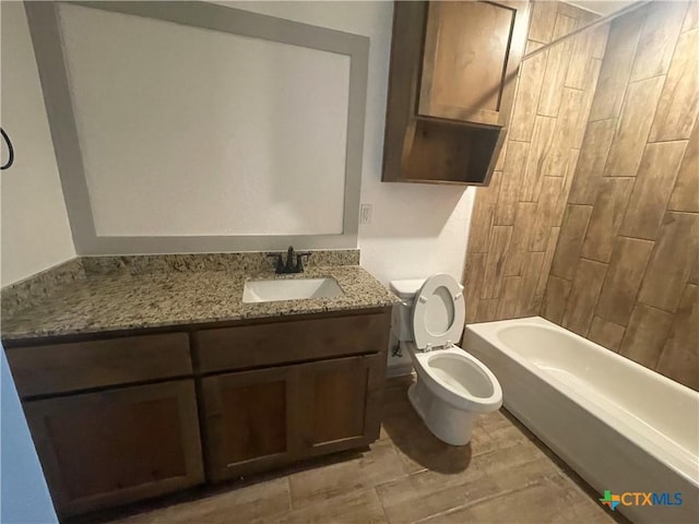2408 Duntov Dr, Temple, TX 76504 - bathroom featuring toilet, vanity, and washtub / shower combination