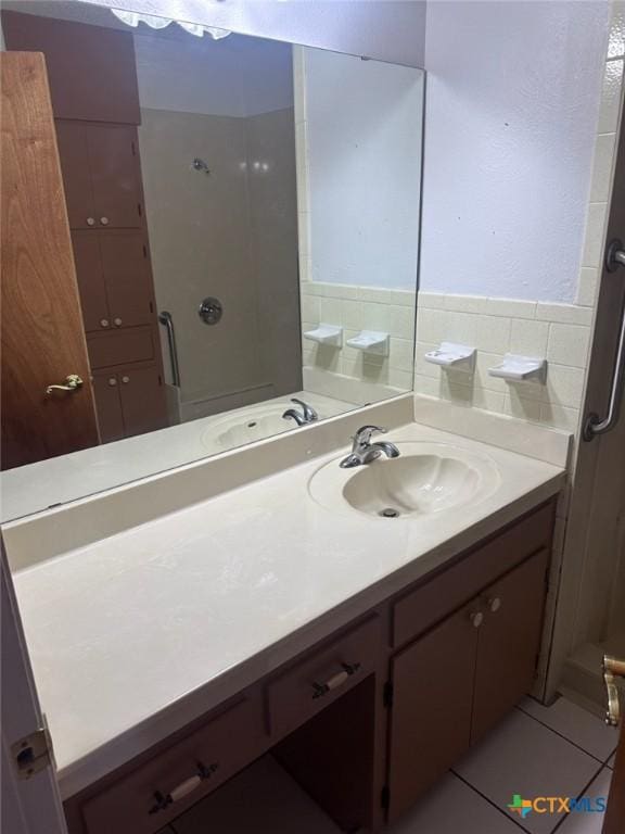 bathroom featuring vanity and tile patterned floors