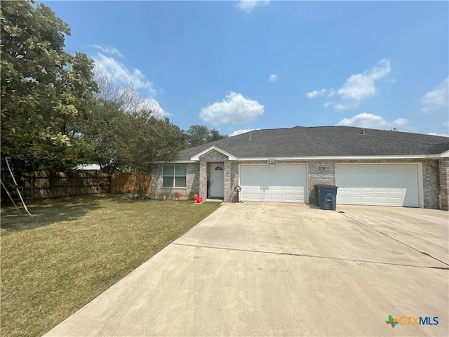 ranch-style house with a front lawn, fence, concrete driveway, roof with shingles, and an attached garage