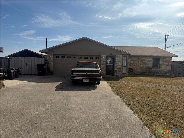 ranch-style house with a garage and a front yard