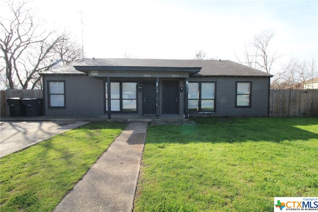 view of front of home with a front yard