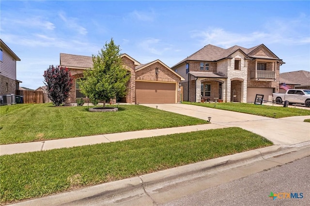 853 Hobby Rd, Copperas Cove, TX 76522 - view of front of house with stone siding, concrete driveway, central AC, an attached garage, and brick siding