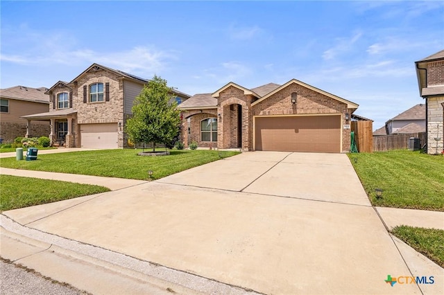 853 Hobby Rd, Copperas Cove, TX 76522 - traditional home featuring brick siding, cooling unit, concrete driveway, and a garage